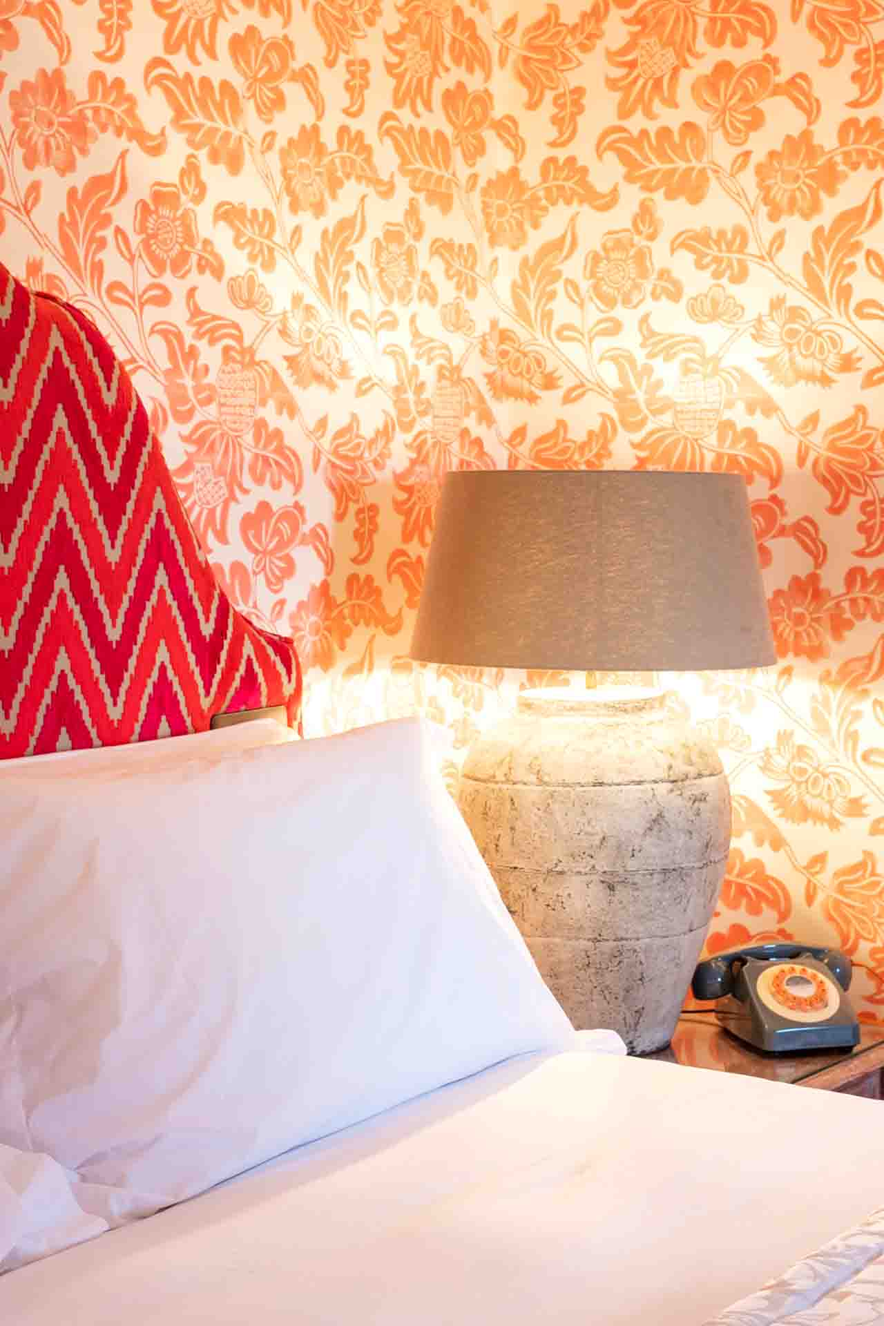 Didier Floral Pattern Wallpaper of 1750 Hanging On A Bedroom Wall