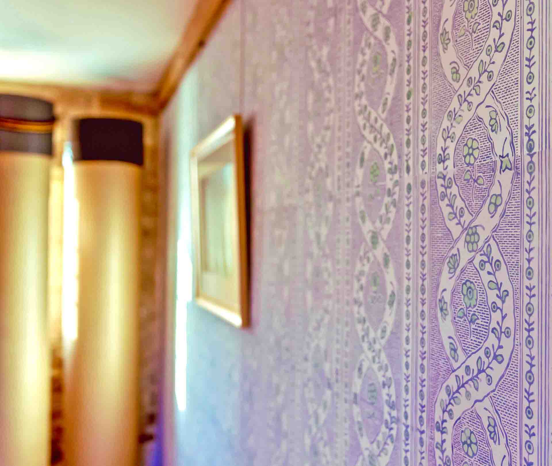 Domino Swag Hand Printed Wallpaper In A Bedroom